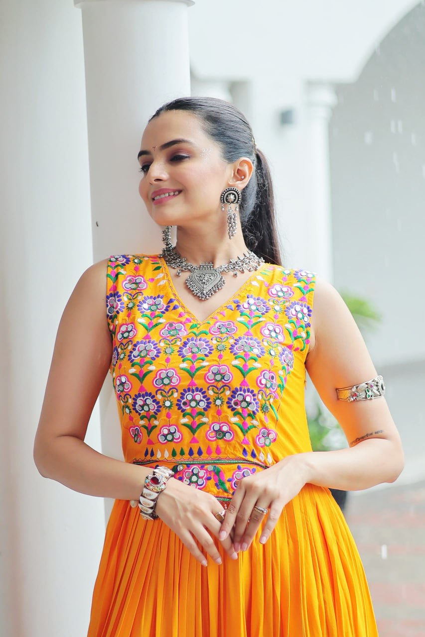 Yellow Rayon Navratri Gown with Kutchi Gamthi Embroidery & Mirror Work – Sleeveless with Flair