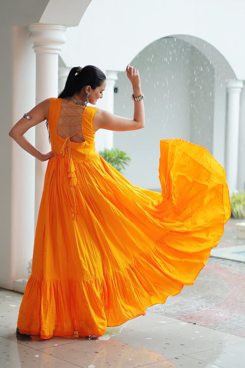 Yellow Rayon Navratri Gown with Kutchi Gamthi Embroidery & Mirror Work – Sleeveless with Flair