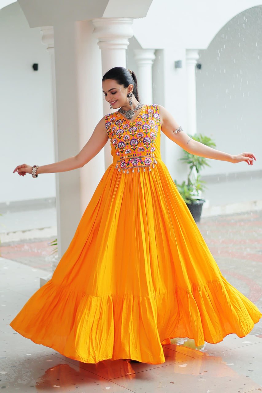 Yellow Rayon Navratri Gown with Kutchi Gamthi Embroidery & Mirror Work – Sleeveless with Flair