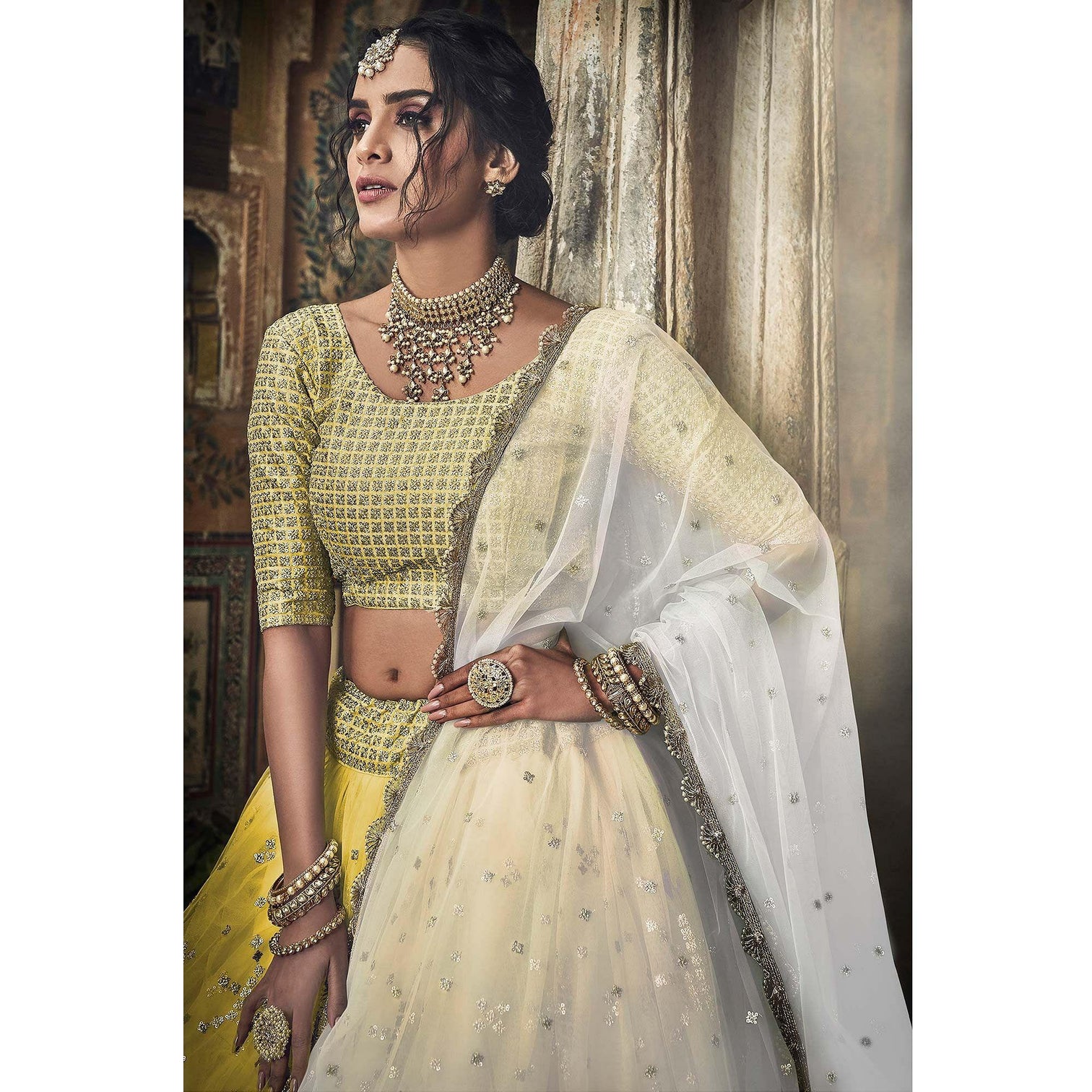 Yellow Sequins Embroidered Net Lehenga Choli