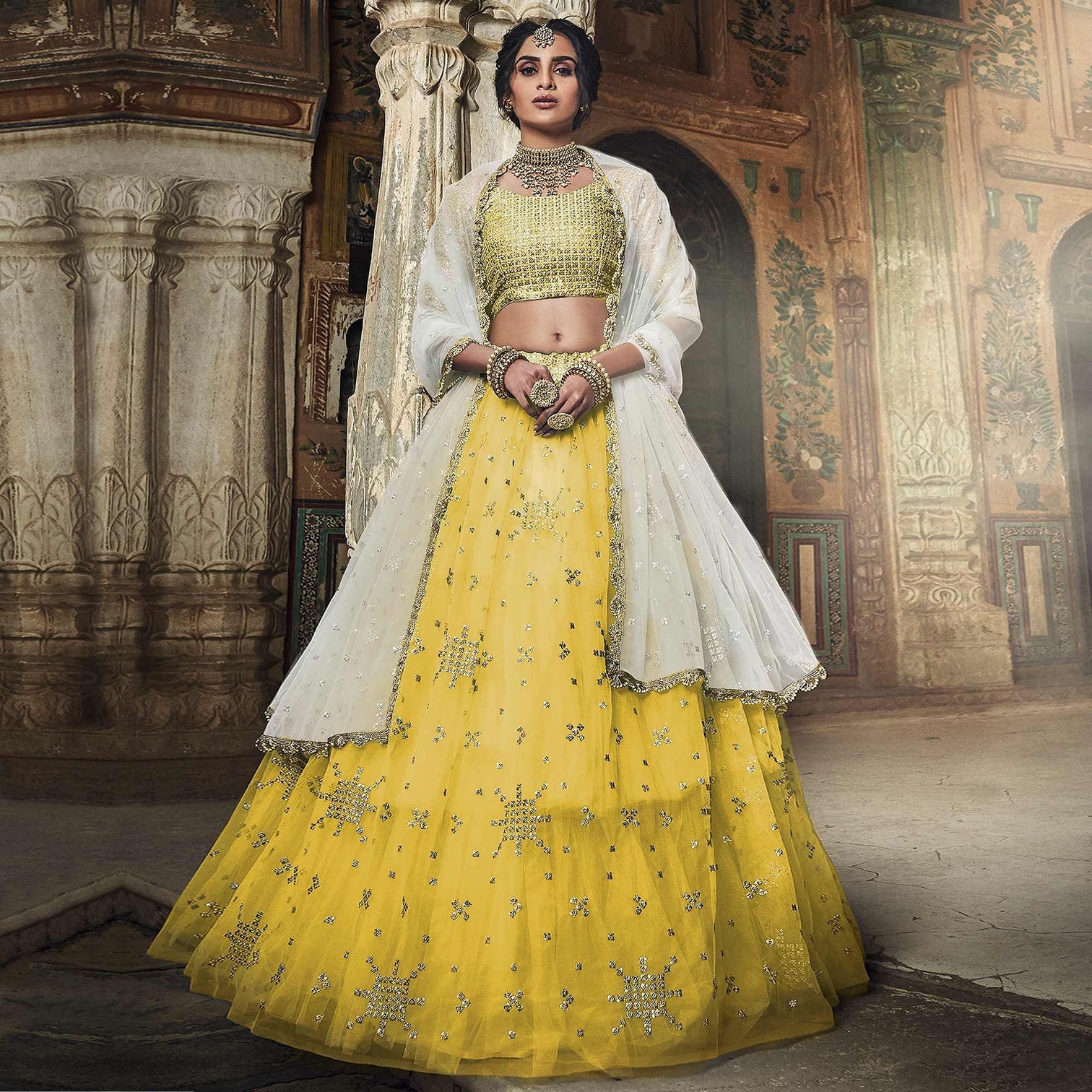 Yellow Sequins Embroidered Net Lehenga Choli