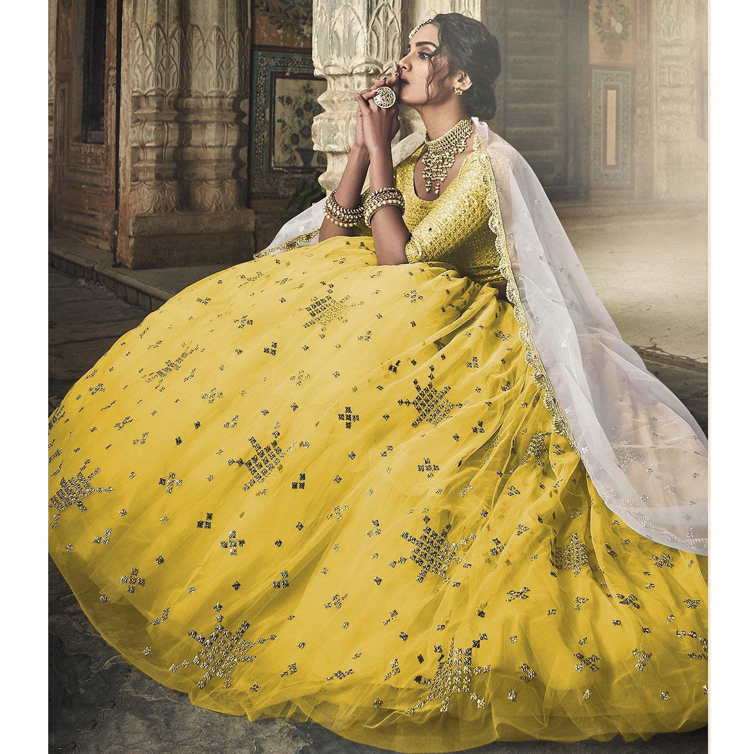 Yellow Sequins Embroidered Net Lehenga Choli