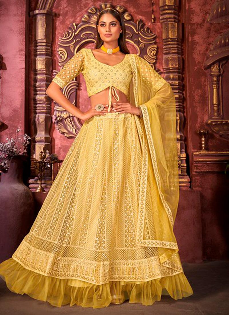 Youthful Net With Designer Work Yellow Color Lehenga Choli