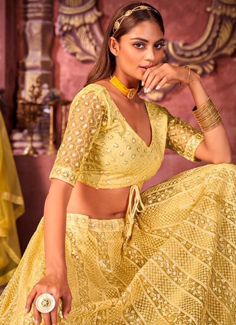 Youthful Net With Designer Work Yellow Color Lehenga Choli