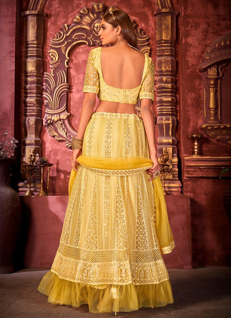 Youthful Net With Designer Work Yellow Color Lehenga Choli