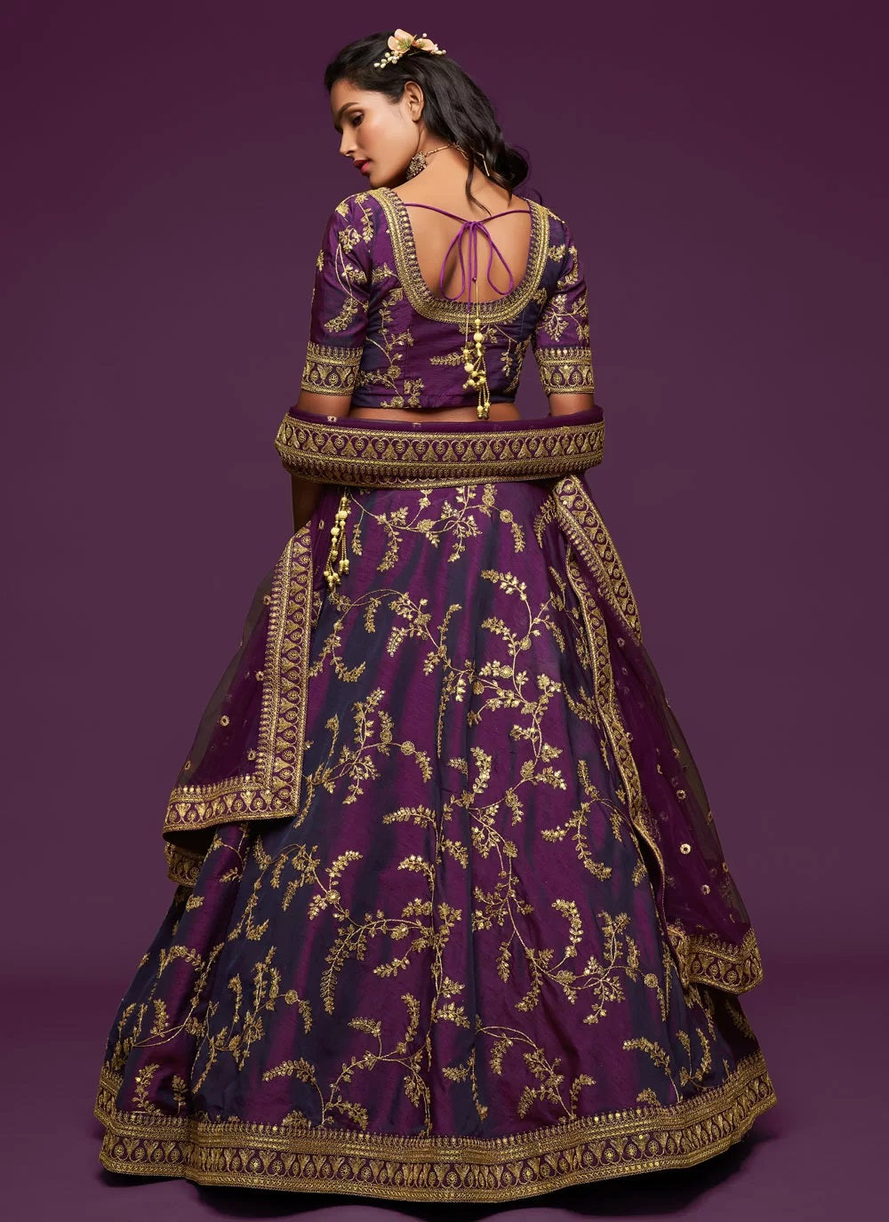 Zari and sequins embroidered wedding lehenga in purple