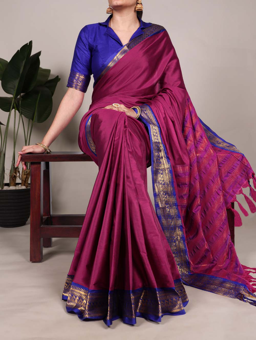 Pink aura silk saree with zari weaving and blue blouse