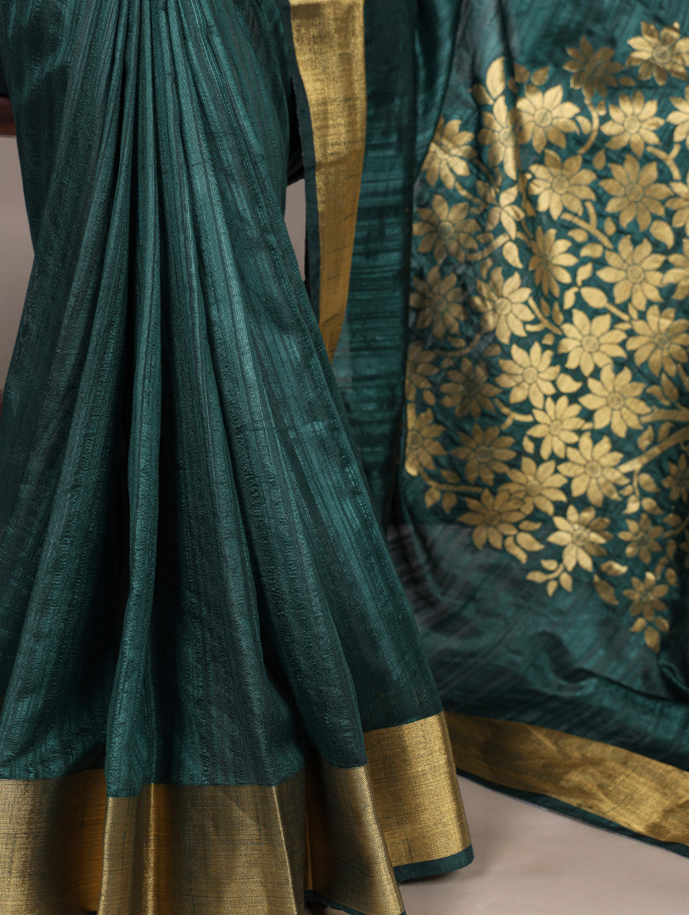 Green raw silk saree with intricate zari weaving unstitched blouse